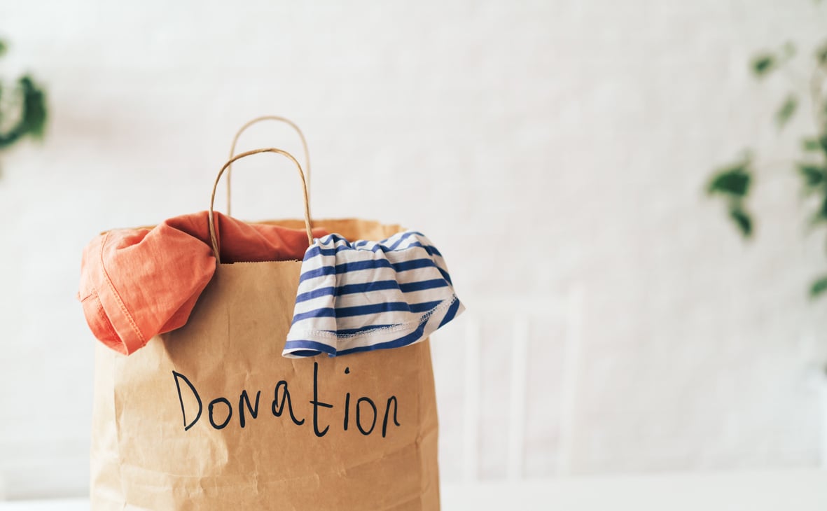 Donation Paper Bag with Used Clothes in Paper Bag